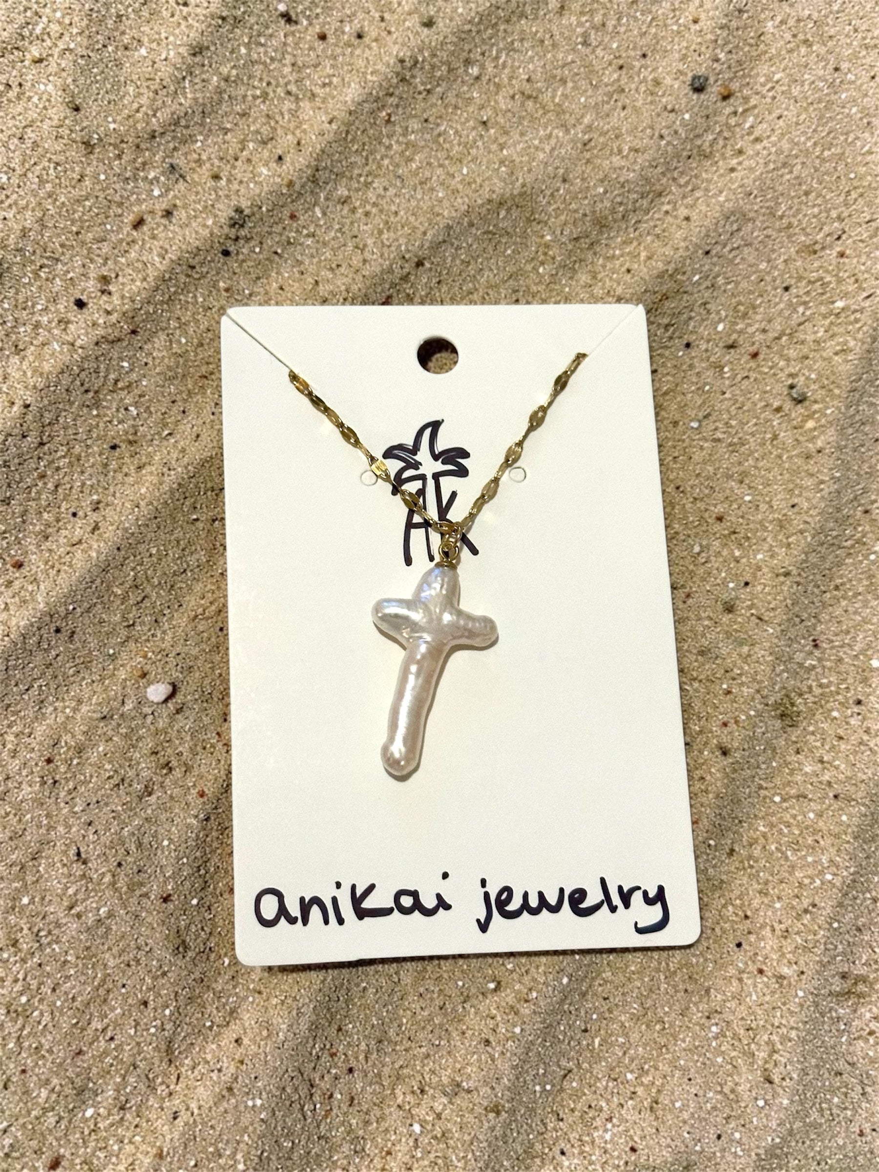 anikas cross necklace